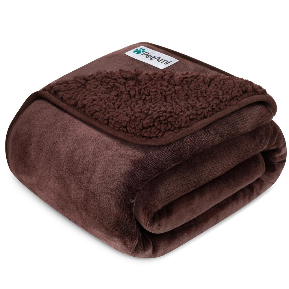 PetAmi waterproof dog blanket on a couch protects furniture from spills.