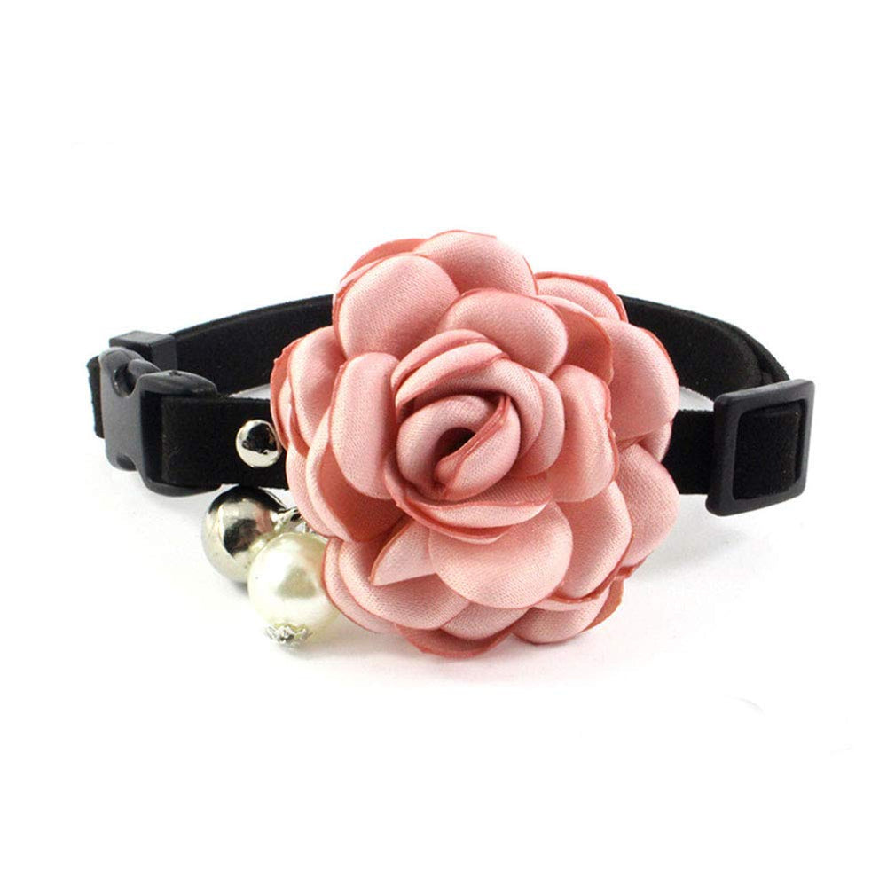 PETFAVORITES Everflowering rose bowtie closeup on pink suede with bell for cute walks.