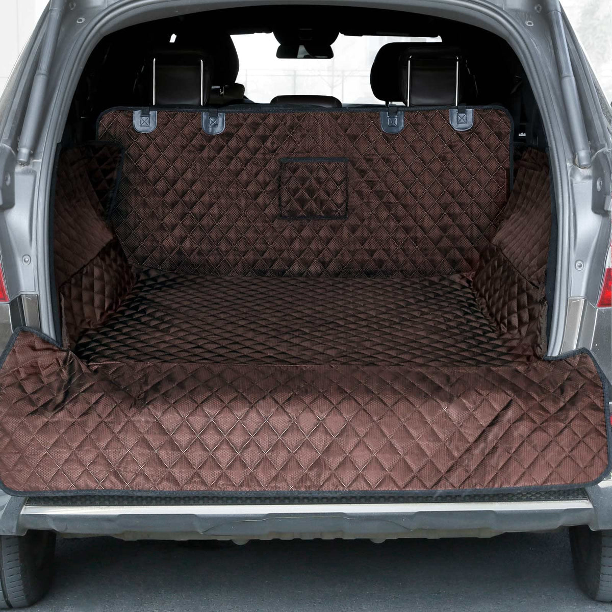 PETICON SUV Cargo Liner folded in a full-size SUV showing universal fit and flexibility.