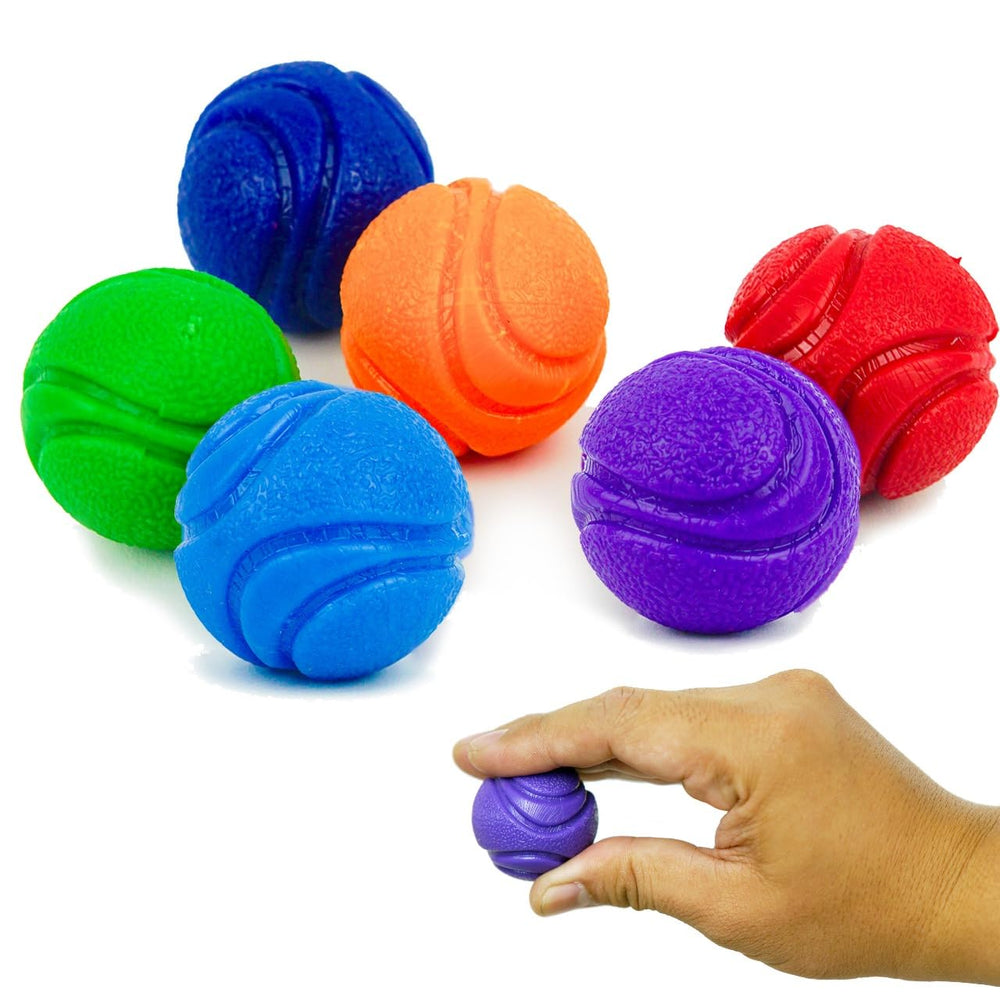 Petite Paws SuperFetch red ball close-up for small dogs, ideal for fetch and teething.