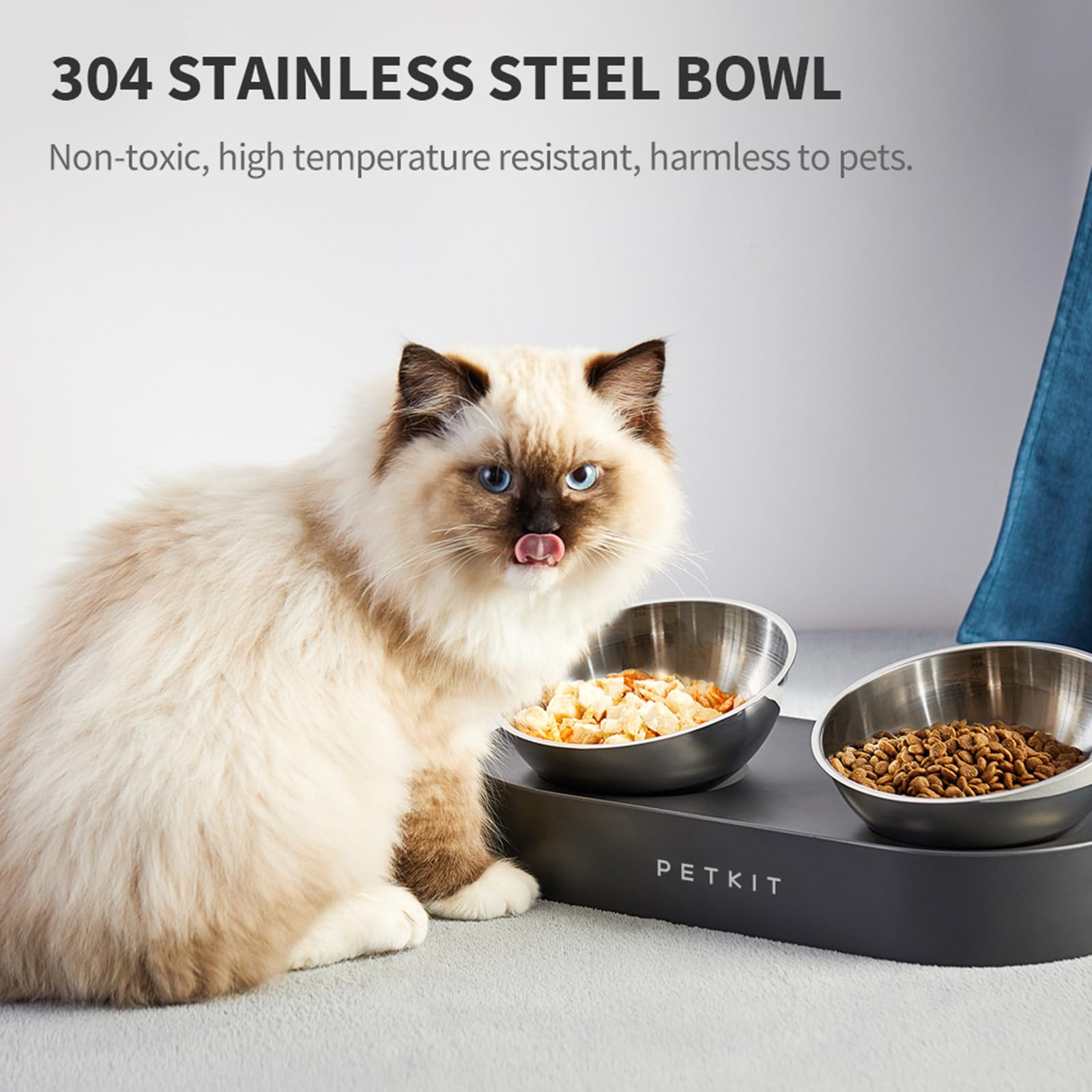 PETKIT Cybertail stainless steel bowl angle view highlights ergonomic tilt for comfortable eating.