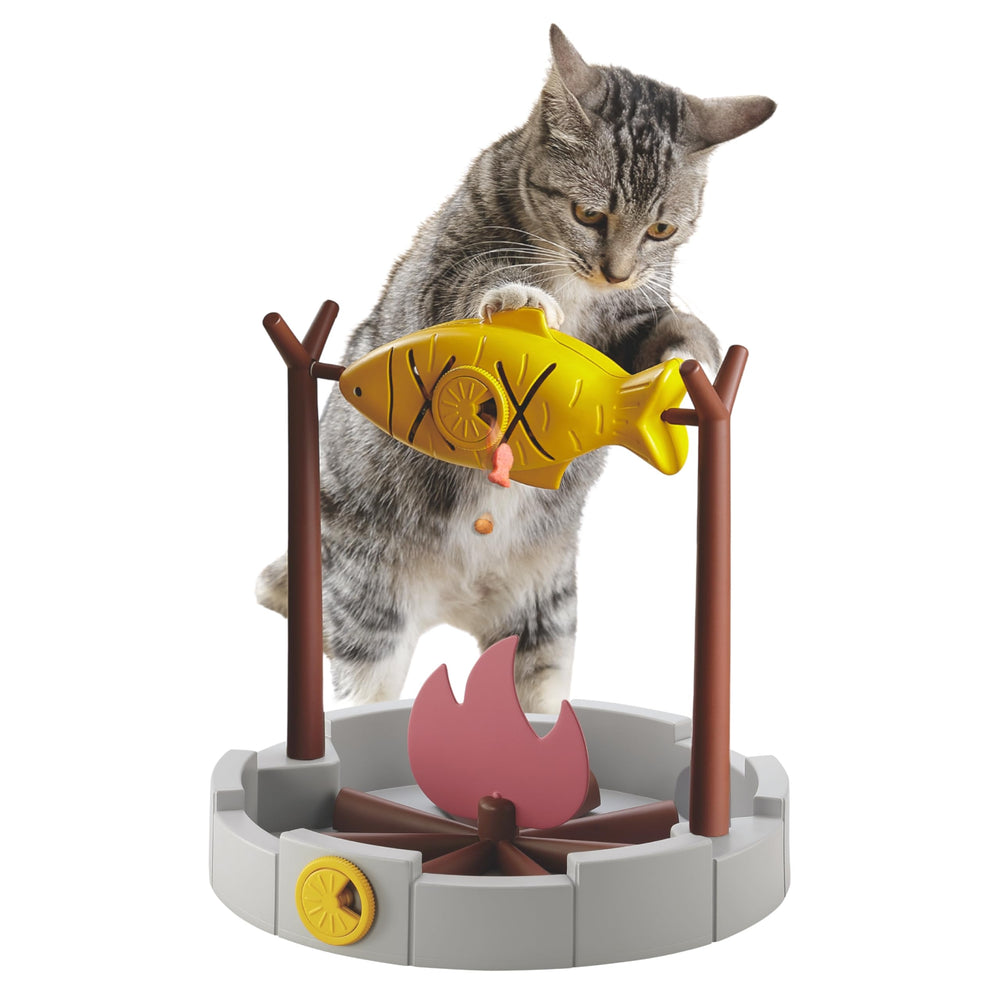 PetPals Grilled Fish cat toy rotating dispenser with adjustable hole for treat sizing.