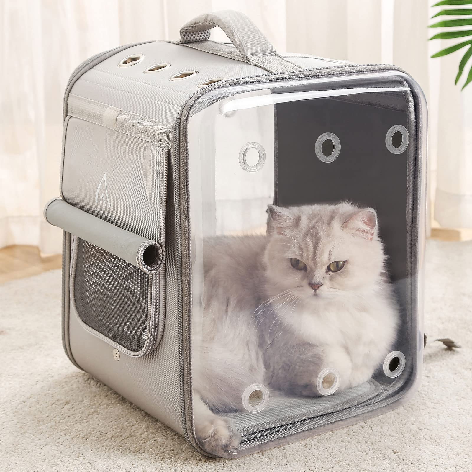 Petseek cat backpack carrier side view shows sturdy exterior and 17 lb load capacity.