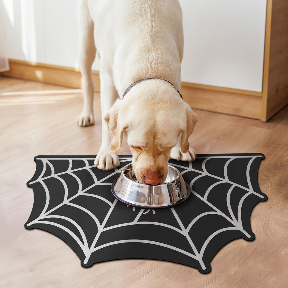 Petsinurarea spider web pet mat with absorbent top layer captures spills quickly.