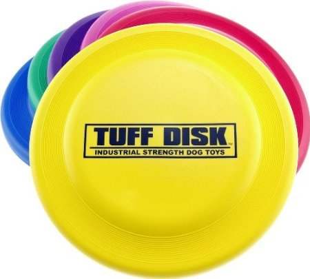 PetSport Tuff Disc in mid-air highlighting perimeter-weighted flight for longer throws.
