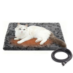 PetTemp heated pad with grey cover on bed for cozy warmth