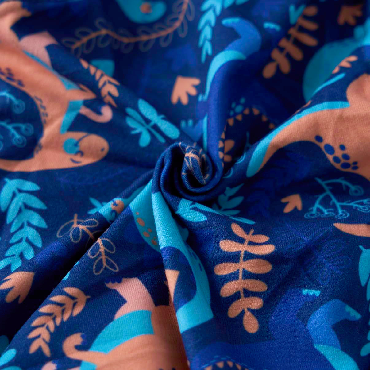 PetWarm dinosaur-patterned green design adds playful style while supporting practical pet care