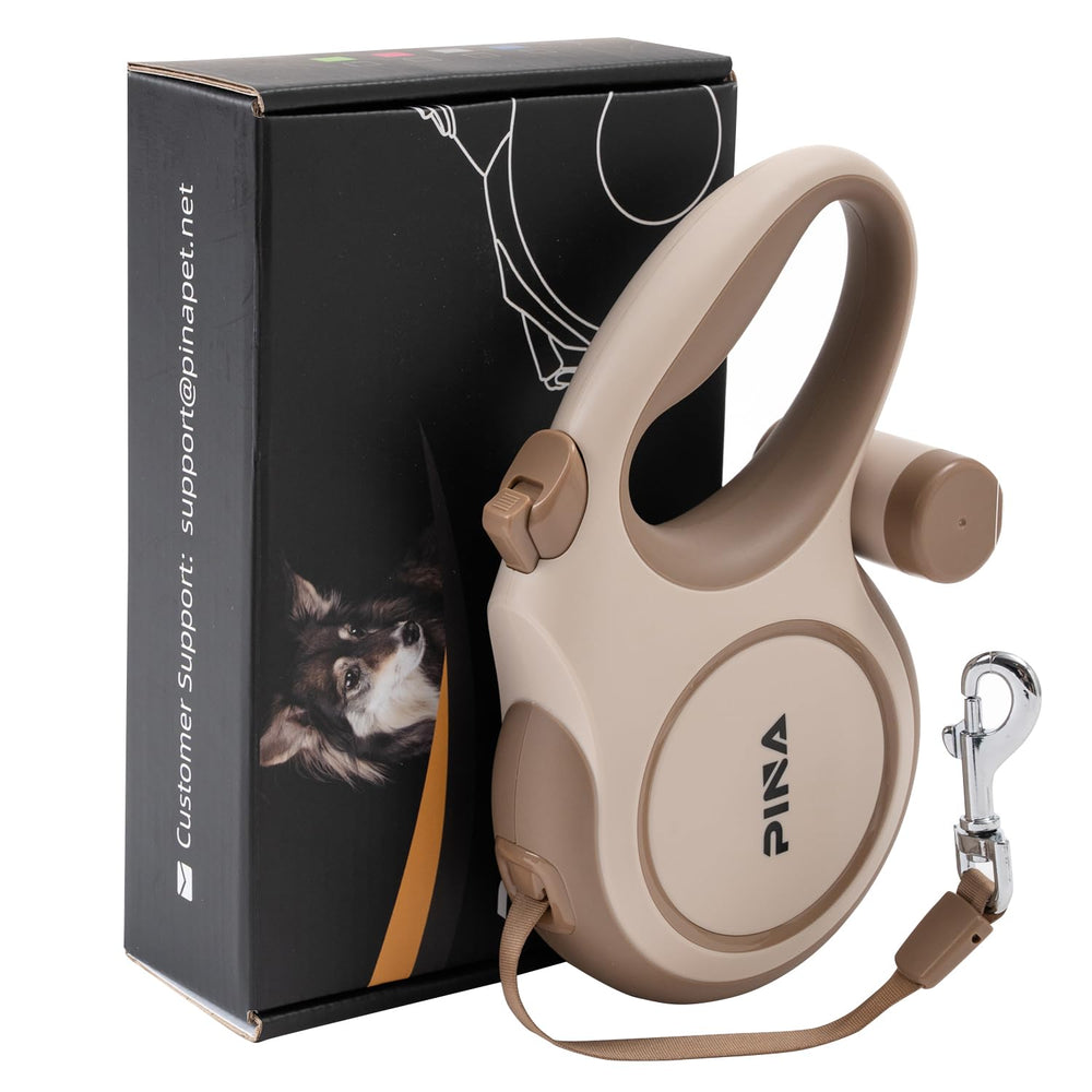 Pina upgraded retractable leash 26ft in park setup offers smooth, extended freedom for dogs up to 110 lbs.