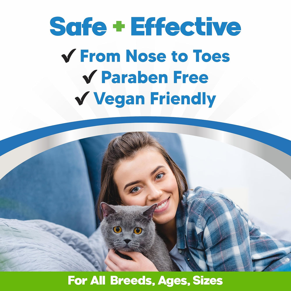 Planopaws paw balm being applied to a cat paw for easy use.
