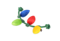 P.L.A.Y. Twinkly Tugger festive lights dog toy shines during playtime for joyful fetch.
