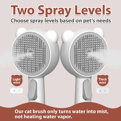 POIIOPY cat steam brush release button highlights self-cleaning feature during grooming.
