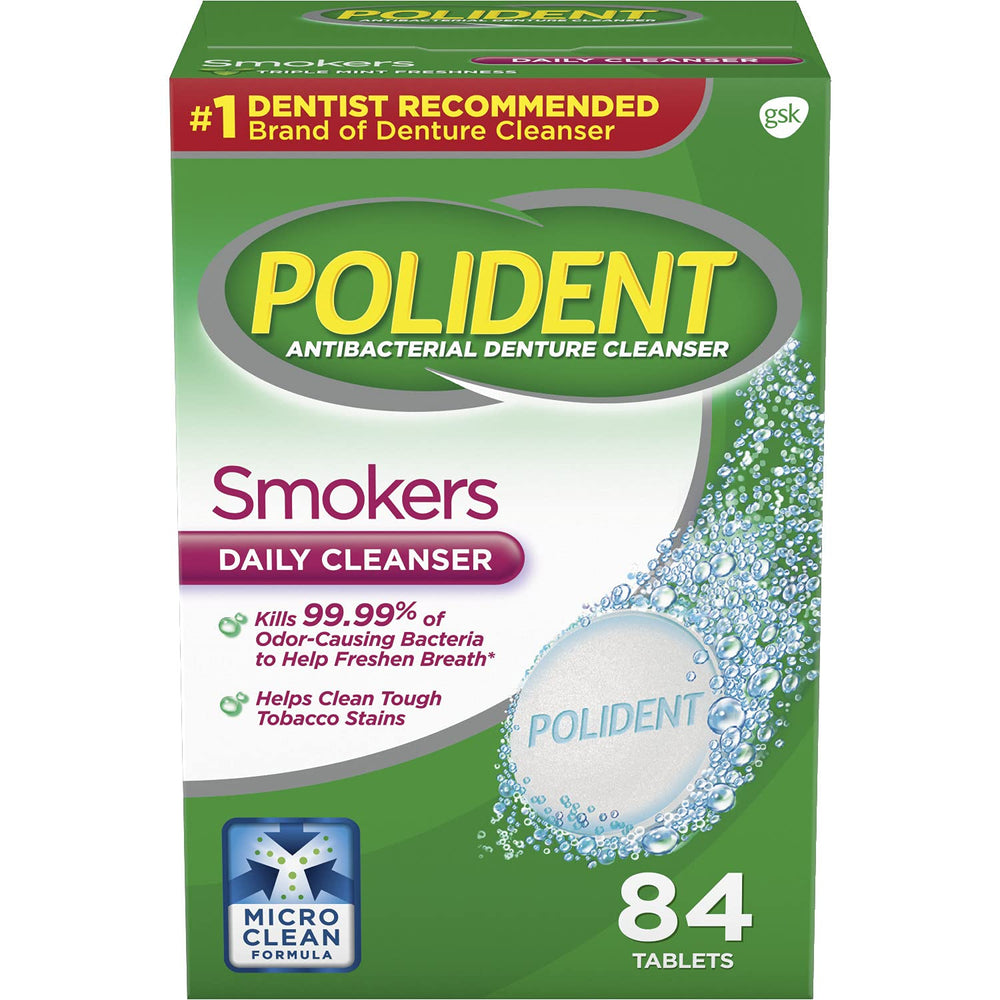 Polident Smokers Denture Cleanser tablets in tub for tobacco stain removal.
