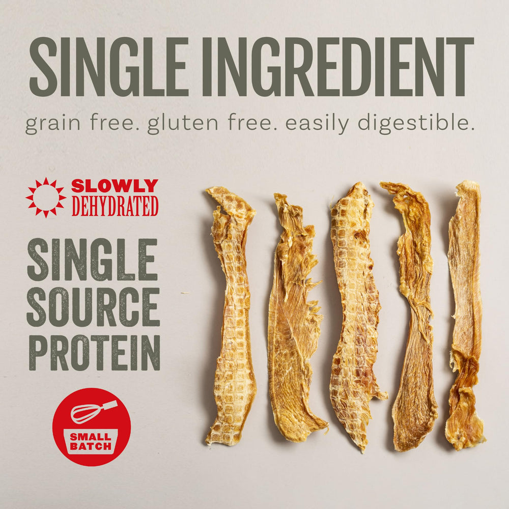 Polkadog Chicken Strip Jerky crunchy texture shown for satisfying bite during play.