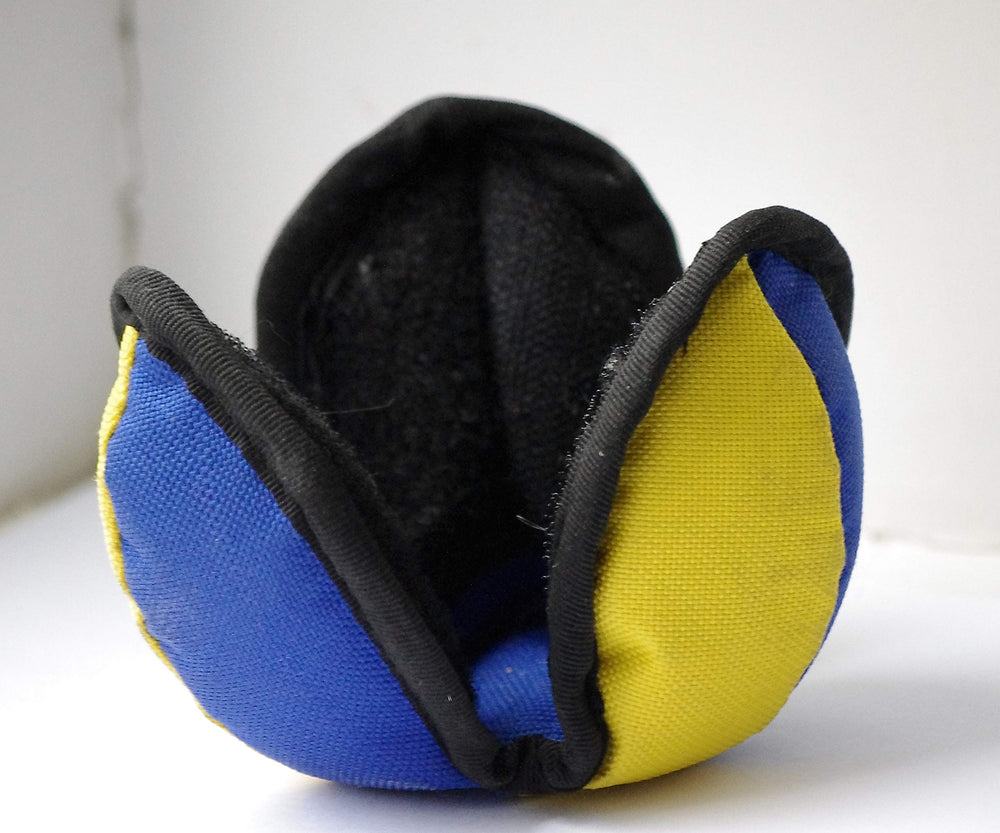 Positive Dogs Lo Ball Treat Pod Medium top view demonstrates durable fabric for long-lasting play.