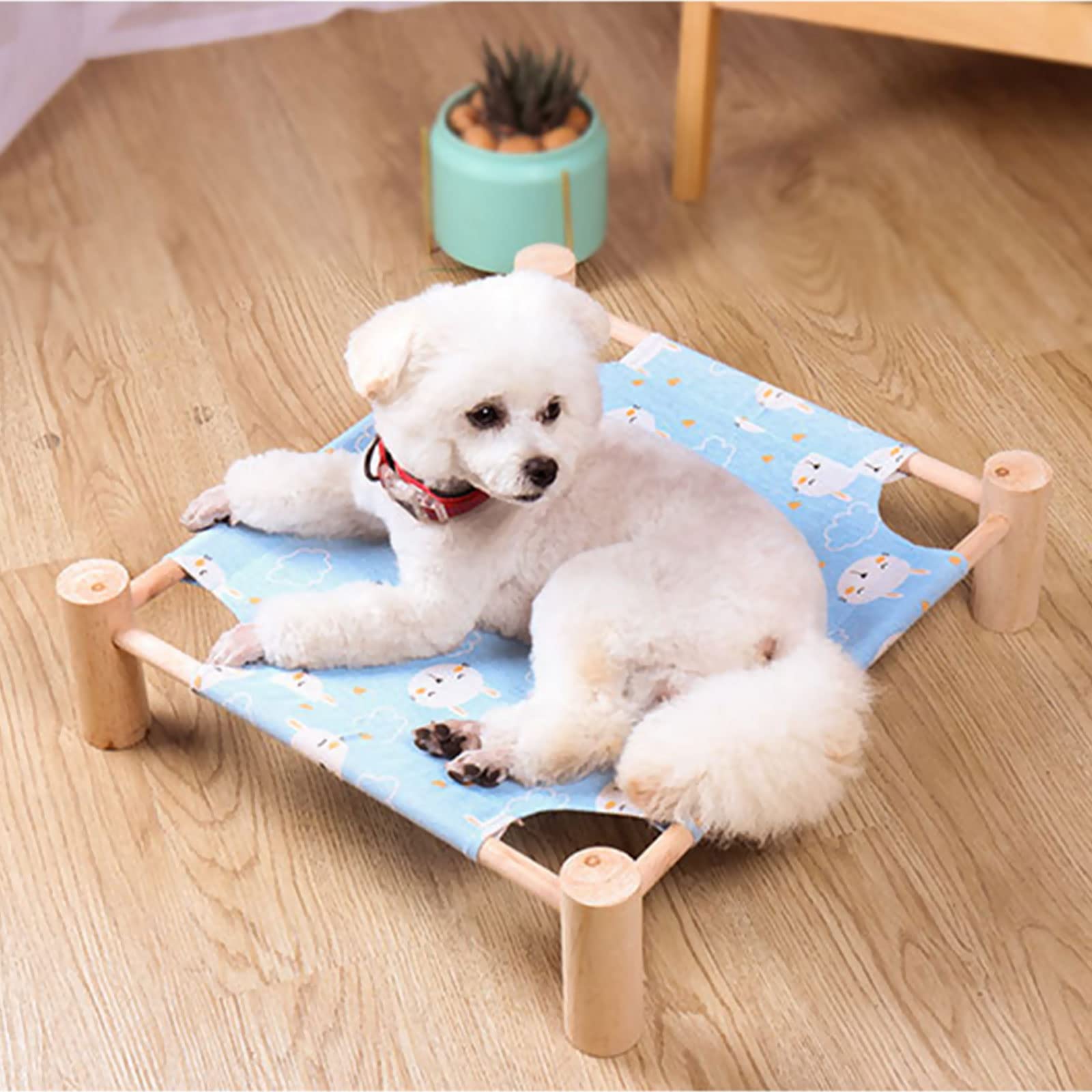 Pozico cat and dog hammock bed on pine wood frame providing sturdy support.