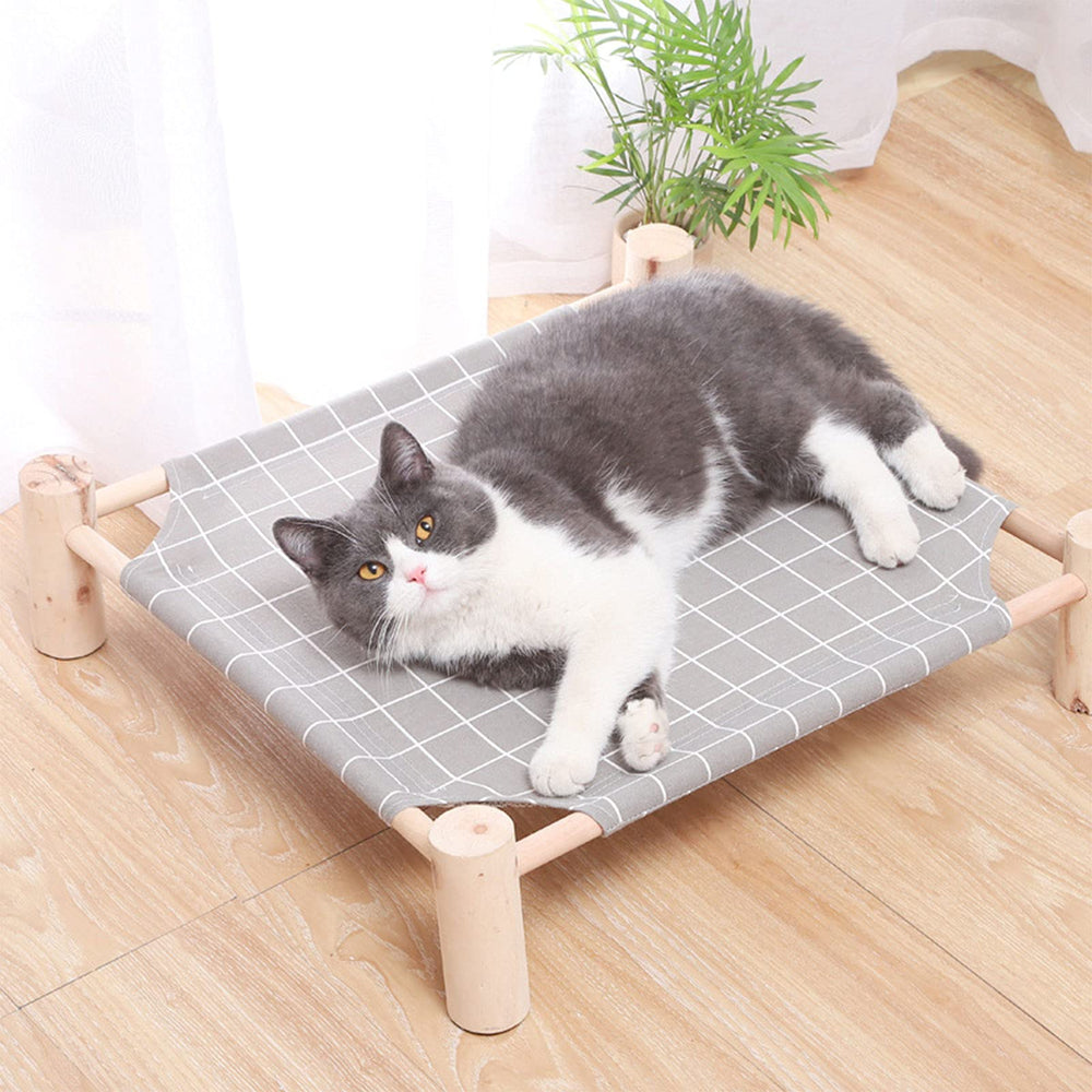 Pozico raised pet hammock bed with pine poles offers secure, calming relaxation