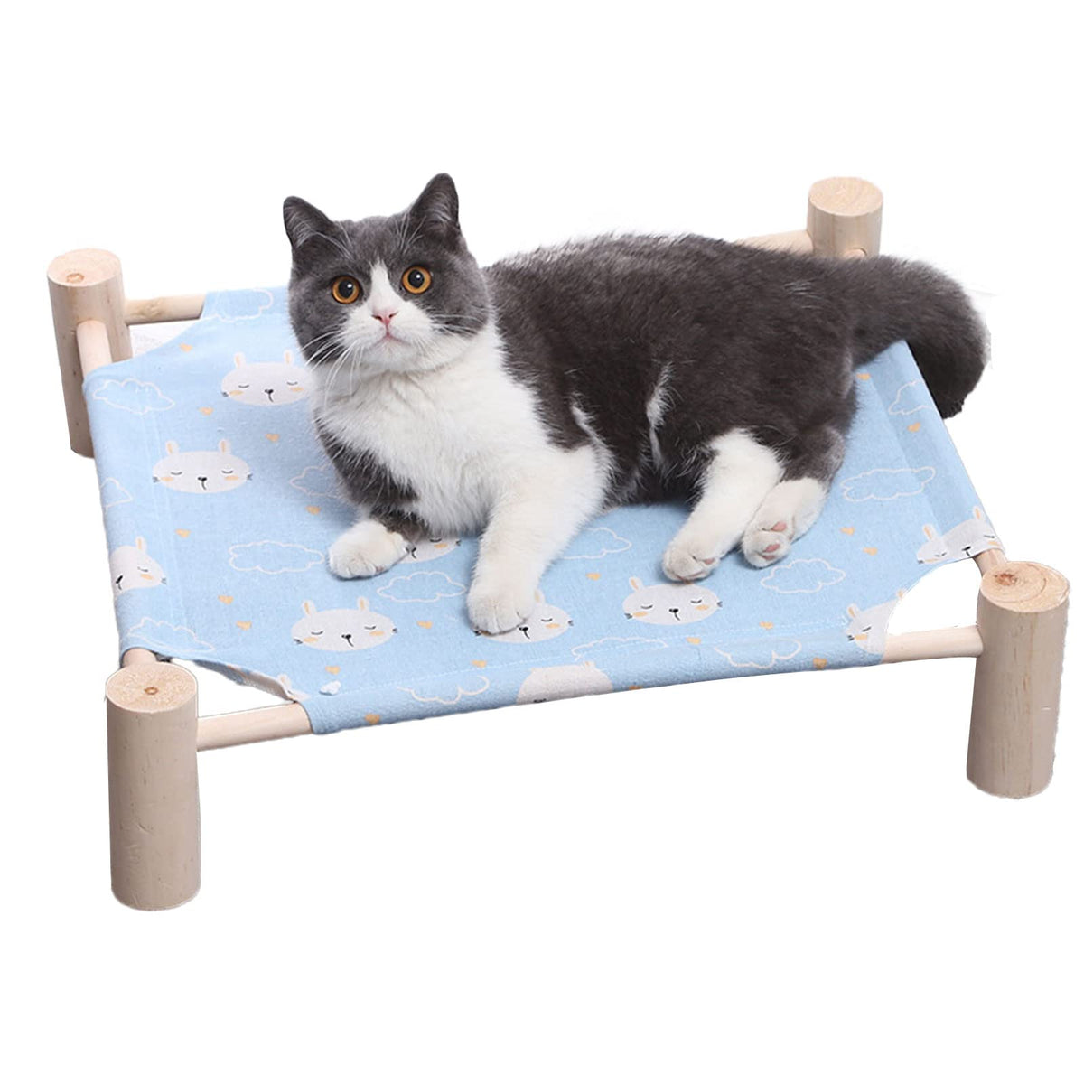 Pozico wooden elevated pet cot with blue rabbit design for secure off-floor rest.
