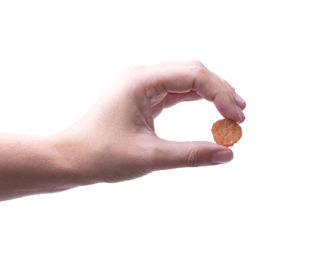 Preen Pets Chicken Jerky Bites treats in bowl—bite-sized rewards for positive training.