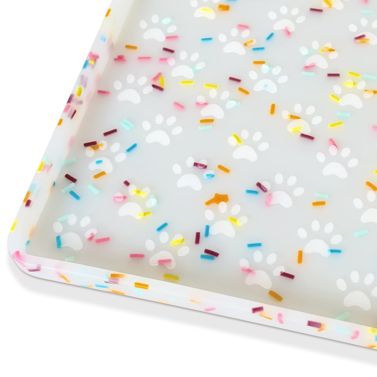 Ptlom dog food mat with raised edges keeps spills off floors.