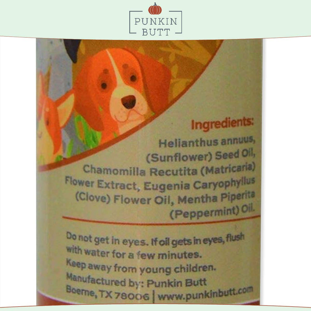 Punkin Butt teething oil application shows a gentle gum massage for teething puppies.