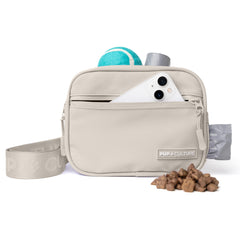 Pup Culture dog treat pouch worn cross-body for easy treats on walks.