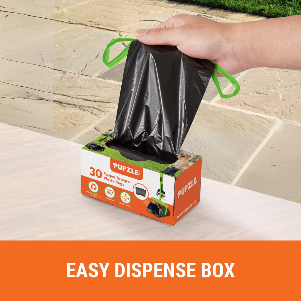 Pupzle black pooper scooper with bag attachment design