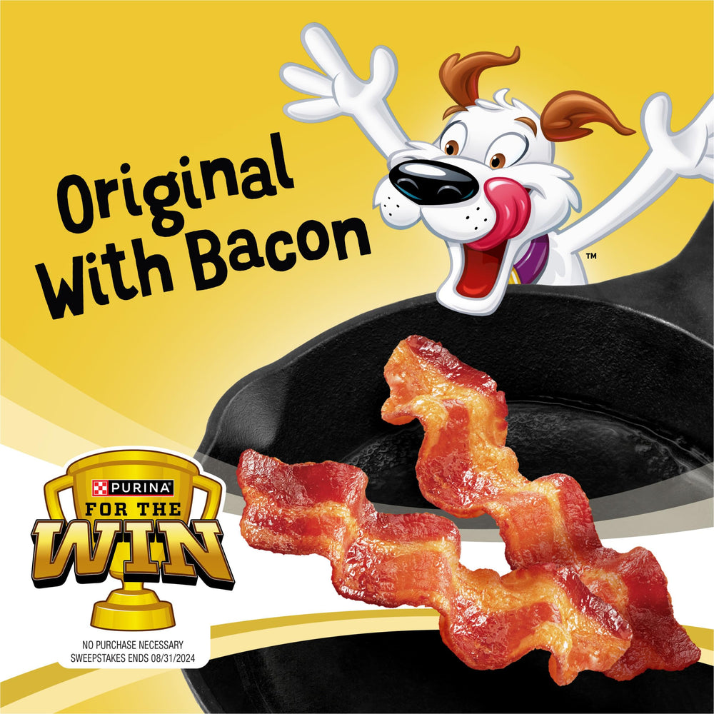 Purina Beggin' Strips dog sniffing bacon aroma signals irresistible flavor.