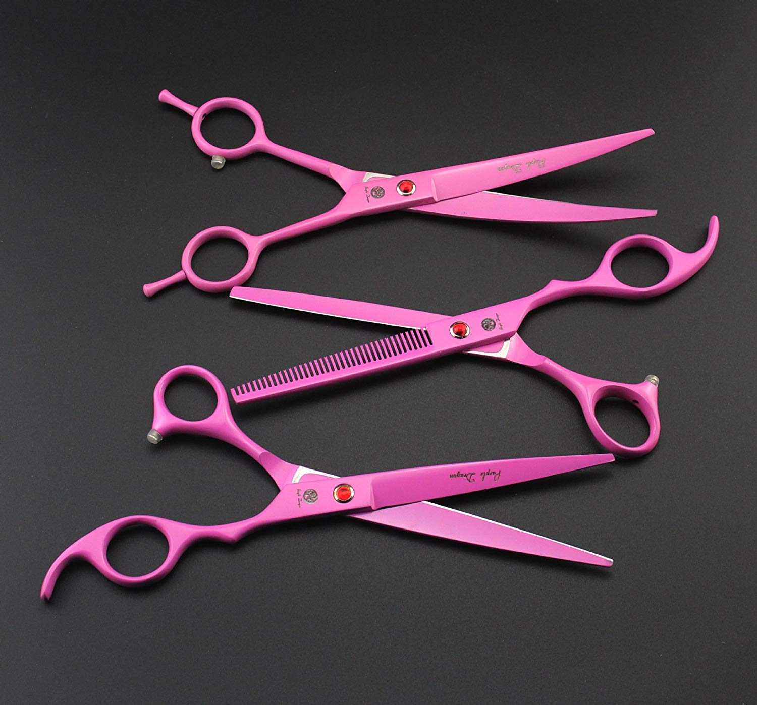 Purple Dragon 7in pink pet grooming scissors in action during grooming