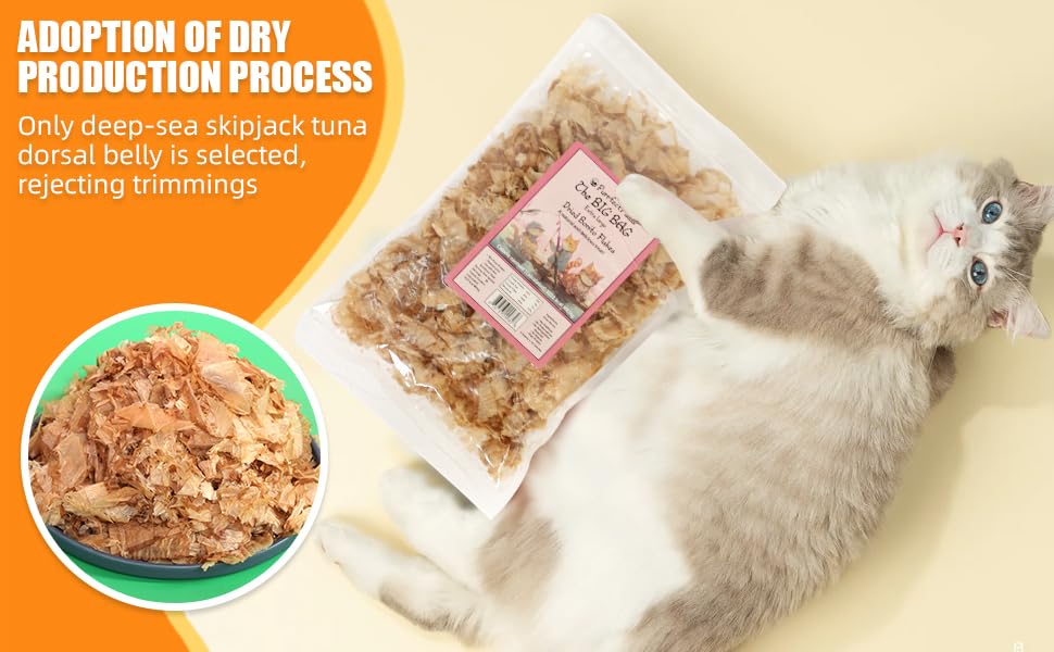 Purrfect Paws bonito flakes sprinkled on cat meal for enhanced flavor.