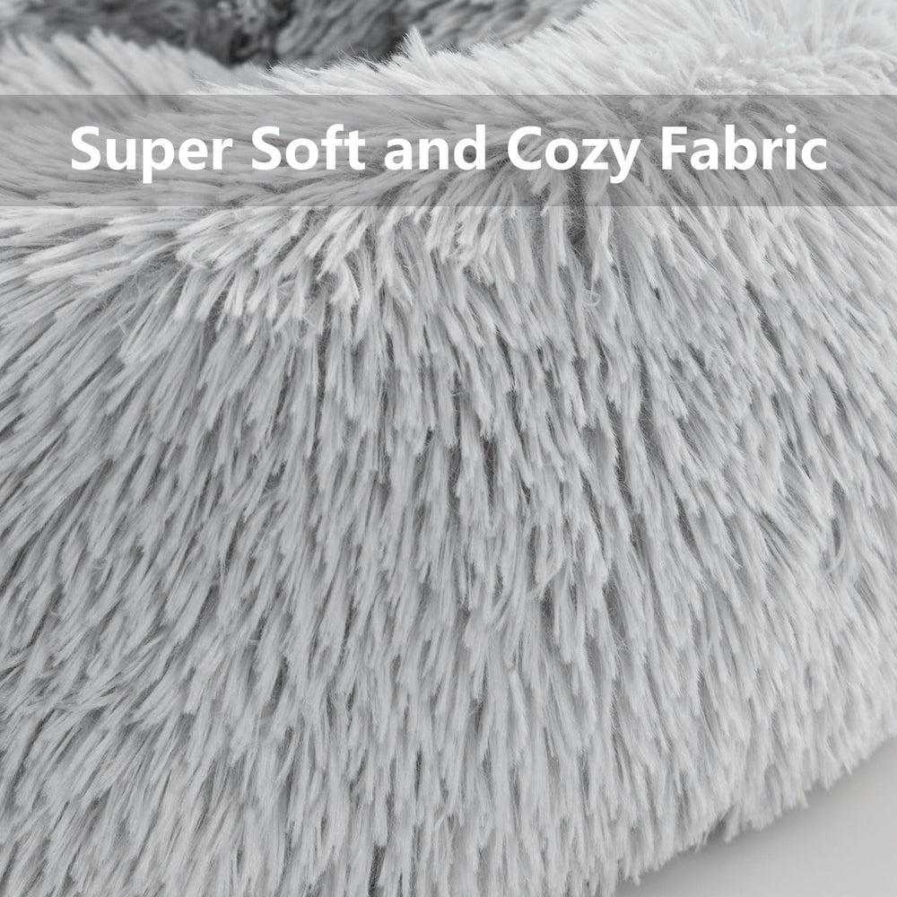 Qinxuepet donut bed light grey color blends with home decor.