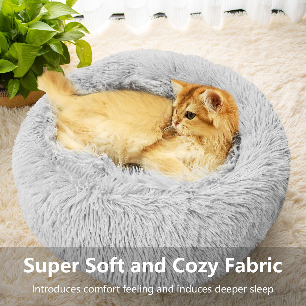 Qinxuepet donut bed invites cozy naps and cuddling during lazy days.