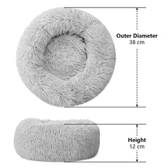 Qinxuepet donut bed slip-resistant bottom keeps the bed stable on tile and wood.
