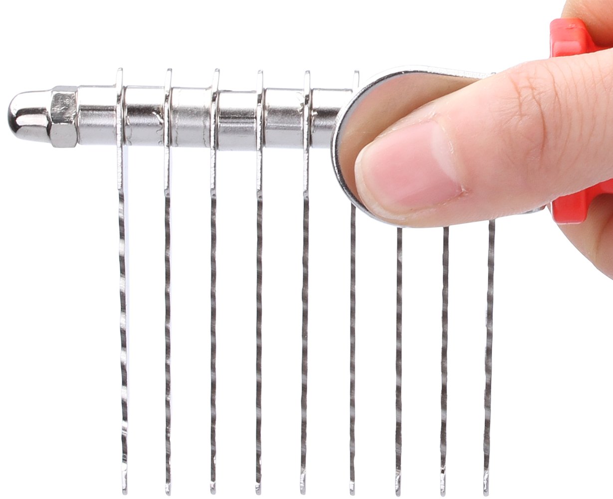 QUMY dog comb detangles thick fur along the back.