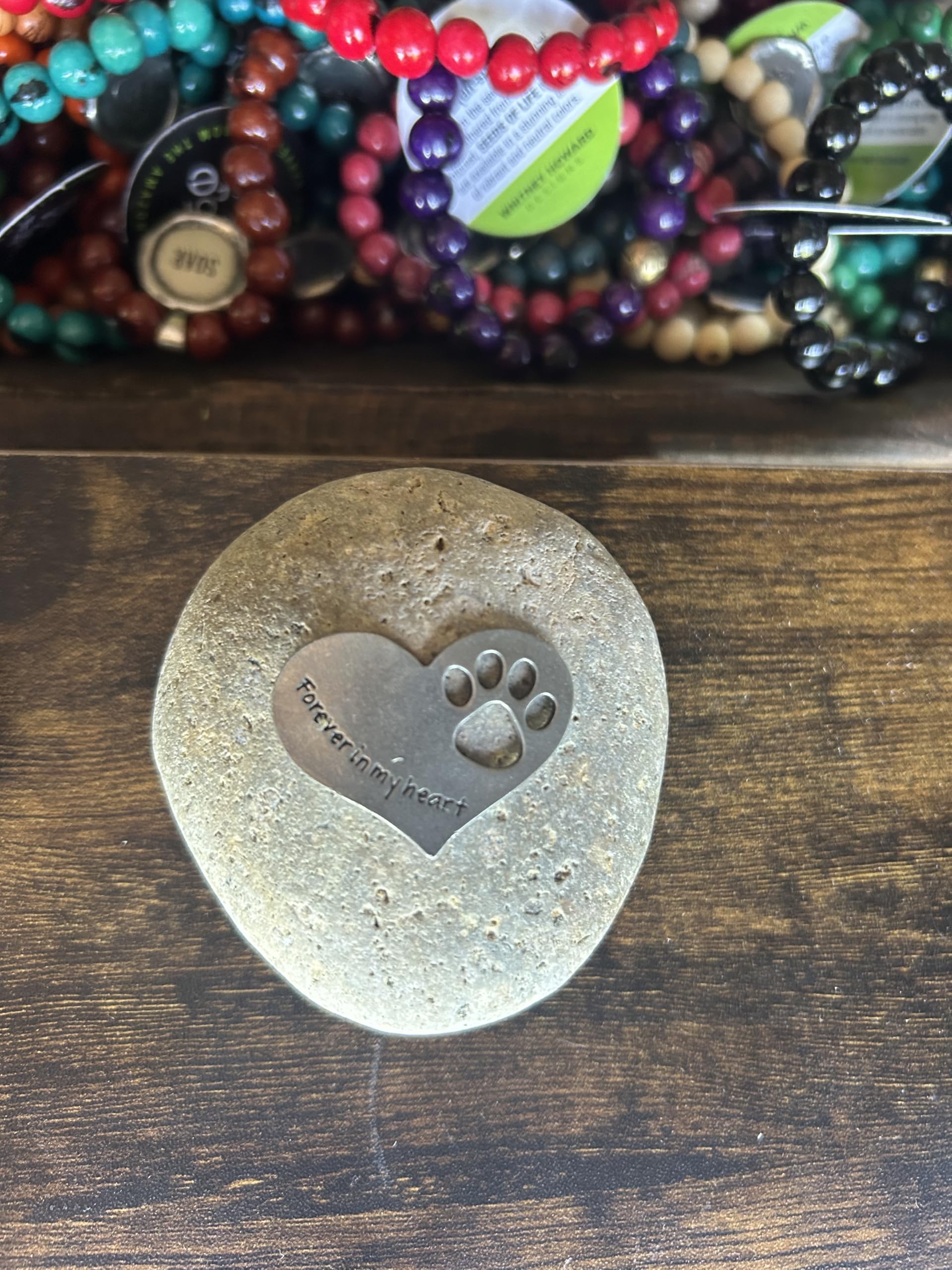 Quotable Cuffs dedicated pet memory display provides a serene memorial focal point.