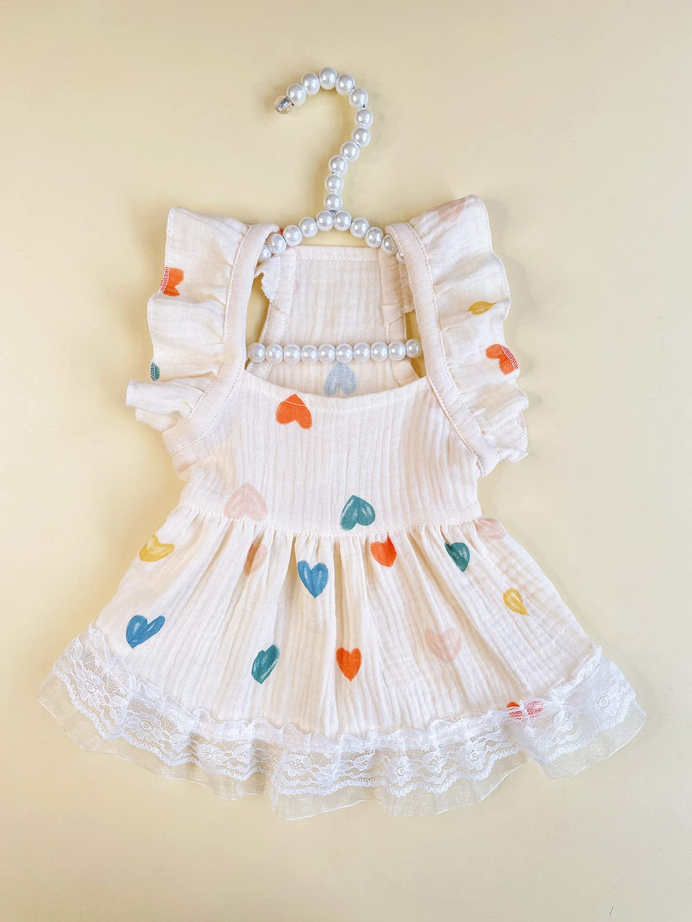 QWINEE pet dress worn outdoors on a sunny day for versatile wear.
