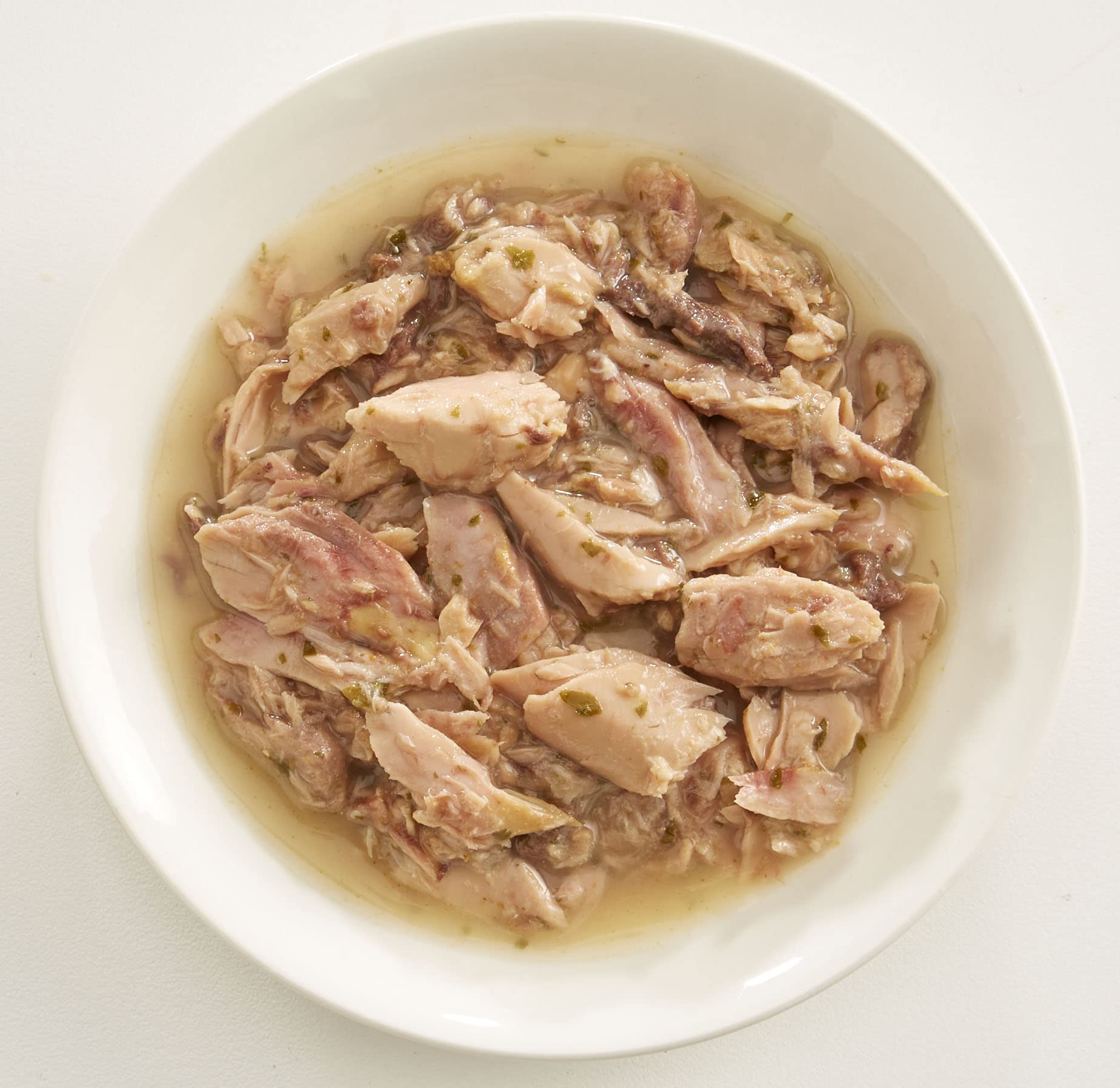 Rawz Aujou Aku tuna and salmon cat food serving bowl image illustrates a nutritionally complete meal