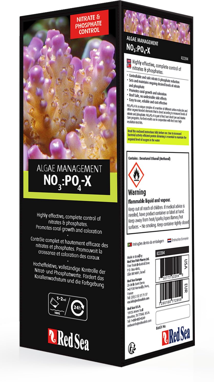 Red Sea NO3:PO4-X dispensing into tank promoting balanced nutrients and water clarity.