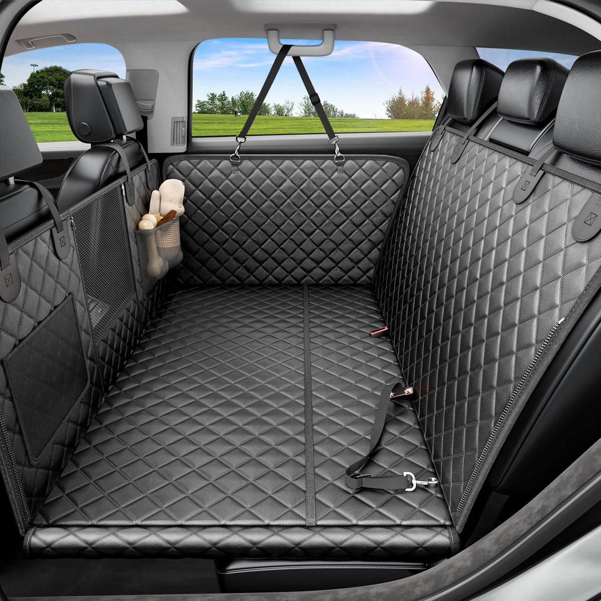 REEVAA dog car seat cover on the back seat keeps pups comfy on long drives.