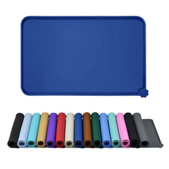 Reopet waterproof feeding mat with raised edges keeps spills contained.