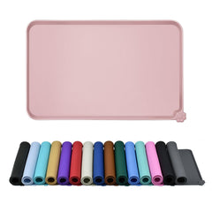 Reopet waterproof pet feeding mat with high-raised edges keeps spills contained during meals.