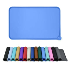 Reopet waterproof pet feeding mat with raised edges contains spills during meals.