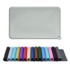 Reopet waterproof pet feeding mat with raised edges keeps spills contained during meals.