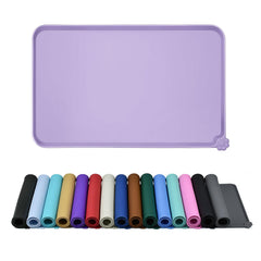 Reopet waterproof pet feeding mat keeps spills contained for clean floors.