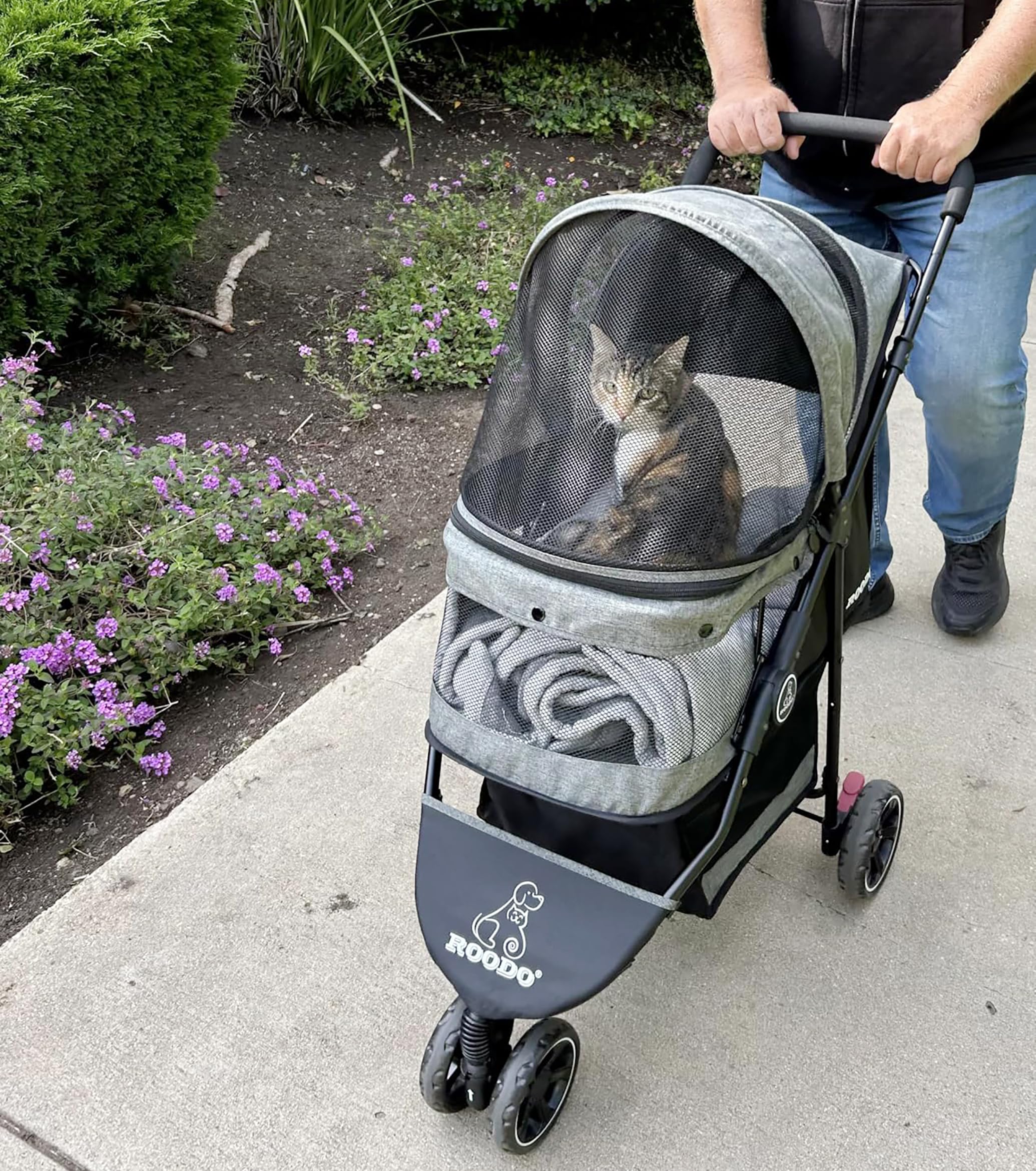 ROODO stroller side folded demonstrates compact trunk storage.