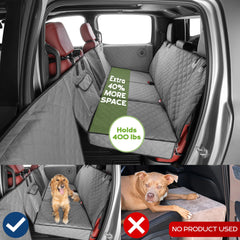 Ruff Liners medium back seat extender with dog sprawled comfortably and supported up to 400 pounds.