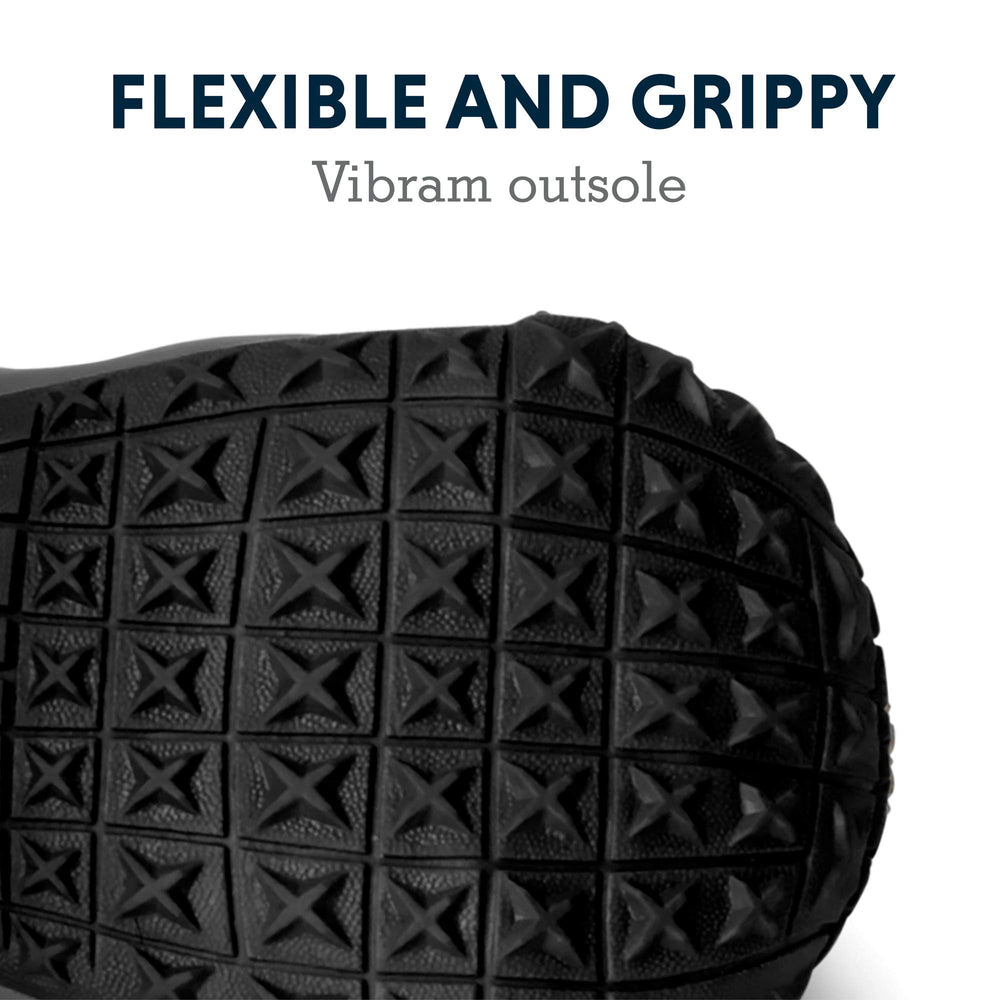 Ruffwear Grip Trex dog shoes snow traction supports confident strides in winter trails.