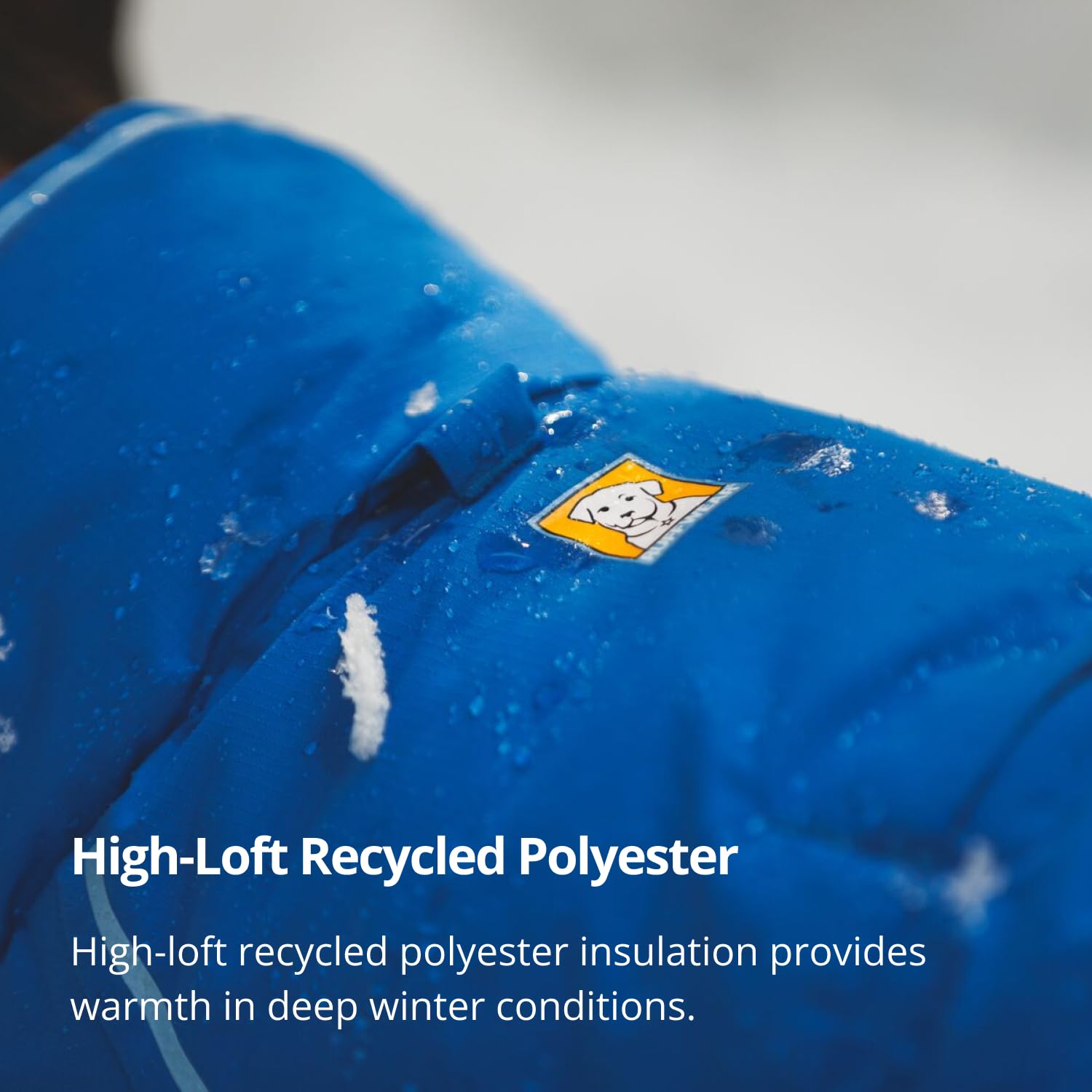 Ruffwear Vert Dog Winter Jacket leg-loops keep coverage centered during runs.