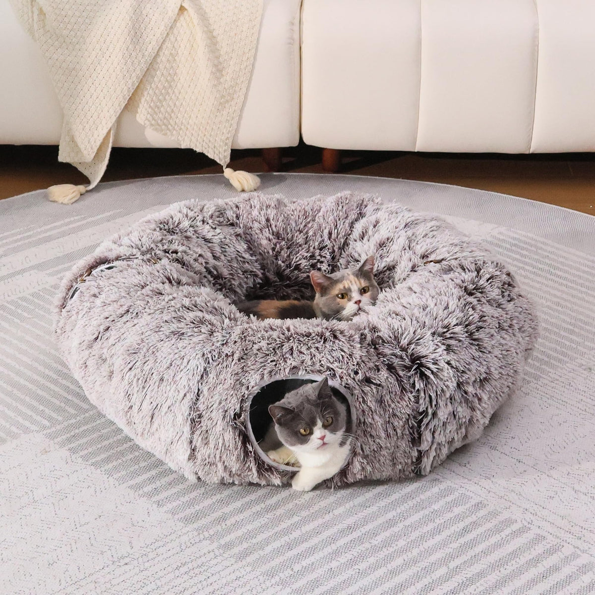 RYpetmia plush cat tunnel bed in living room setup offers a cozy retreat for indoor cats.