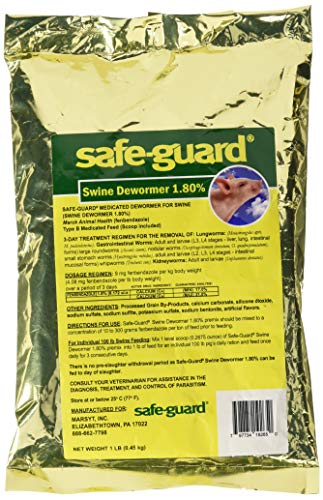 Safe-Guard Swine Scoop in use, simplifying parasite management for pigs.
