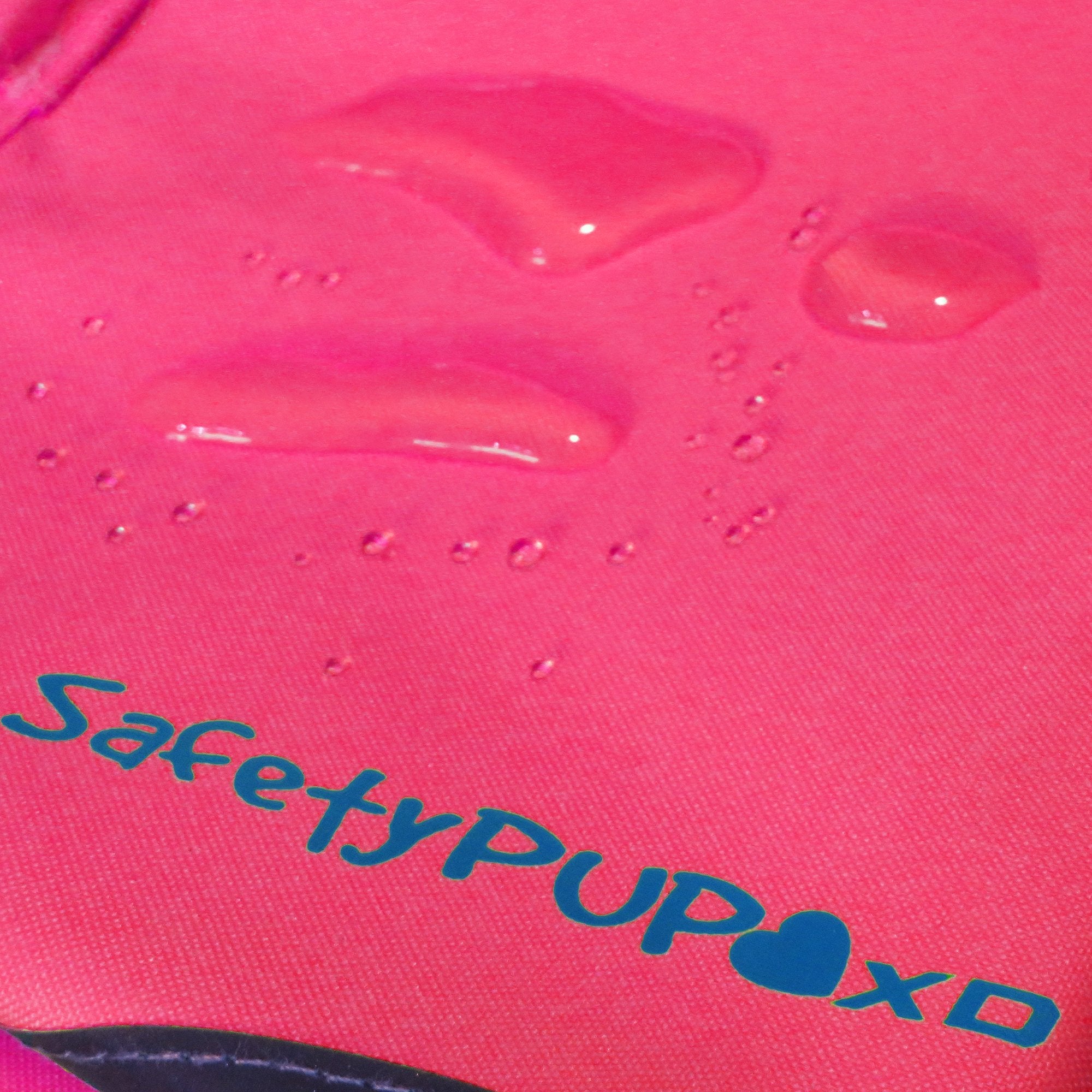 SafetyPUP XD urban vest pink worn in rain shows all-weather protection